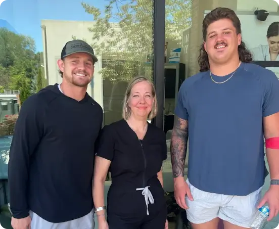 Founder Lisa Kubiak, RN, with clients outside the Athens, GA flagship location, serving the UGA community and active Five Points residents.