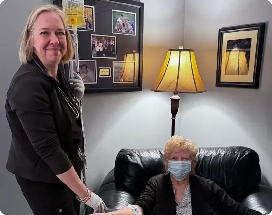 Medical-grade IV nutrition therapy for chronic fatigue and wellness. Athens senior getting IV infusion.